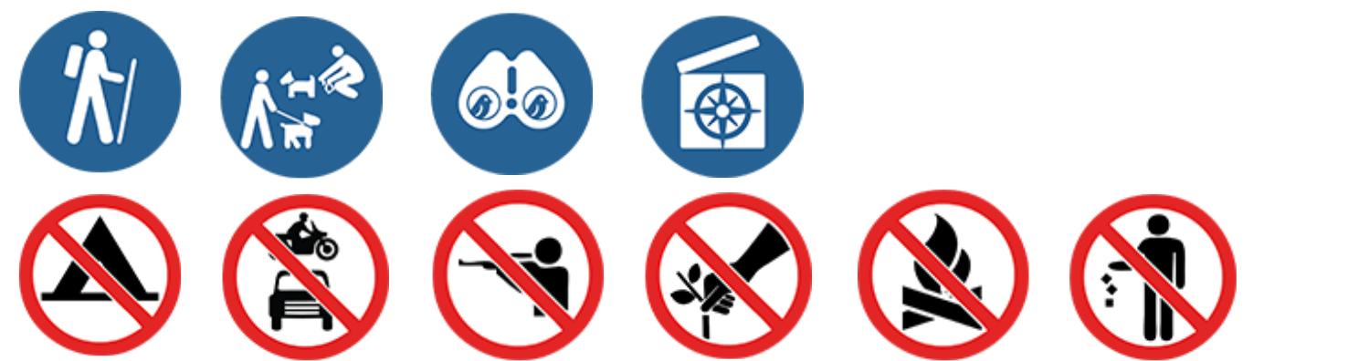 A blue circle with a white and black logoDescription automatically generated